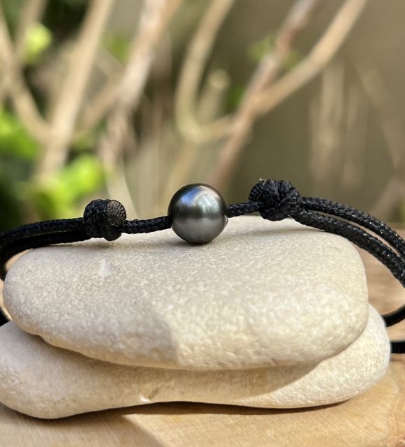 Bijou en perle de Tahiti aux reflets rares et lustre exceptionnel. Certificat d’authenticité et livraison sécurisée – Poemotu.