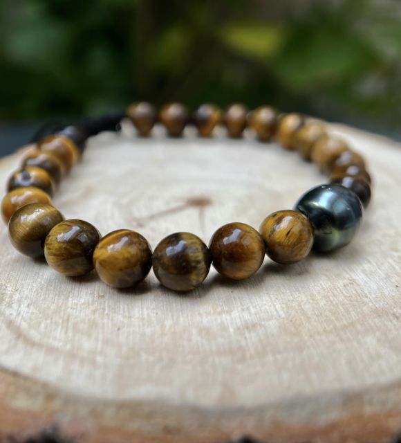 Bijou en perle de Tahiti aux reflets rares et lustre exceptionnel. Certificat d’authenticité et livraison sécurisée – Poemotu.