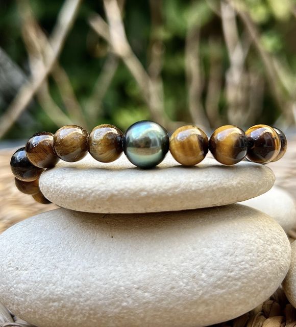 Bijou en perle de Tahiti aux reflets rares et lustre exceptionnel. Certificat d’authenticité et livraison sécurisée – Poemotu.