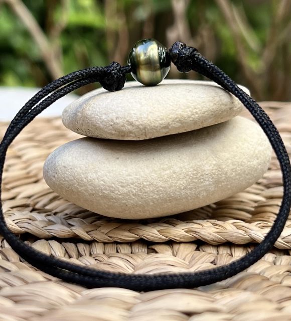 Bijou en perle de Tahiti aux reflets rares et lustre exceptionnel. Certificat d’authenticité et livraison sécurisée – Poemotu.