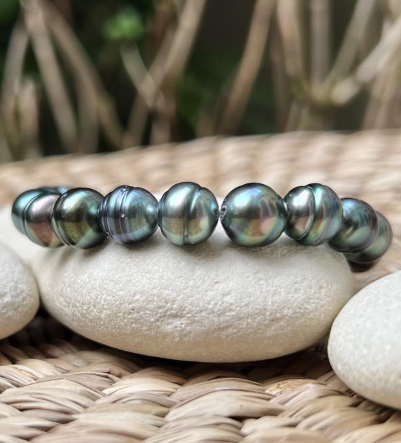 Bijou en perle de Tahiti aux reflets rares et lustre exceptionnel. Certificat d’authenticité et livraison sécurisée – Poemotu.