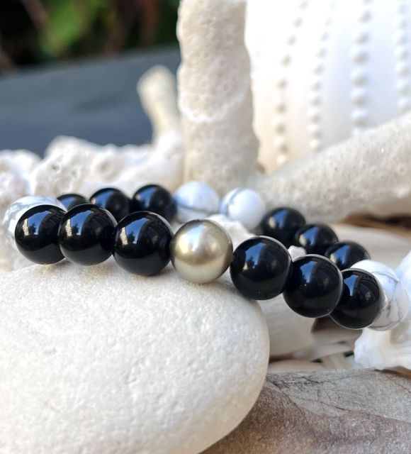 Bijou en perle de Tahiti aux reflets rares et lustre exceptionnel. Certificat d’authenticité et livraison sécurisée – Poemotu.