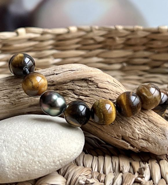 Bijou en perle de Tahiti aux reflets rares et lustre exceptionnel. Certificat d’authenticité et livraison sécurisée – Poemotu.