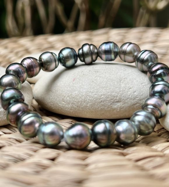 Bijou en perle de Tahiti aux reflets rares et lustre exceptionnel. Certificat d’authenticité et livraison sécurisée – Poemotu.