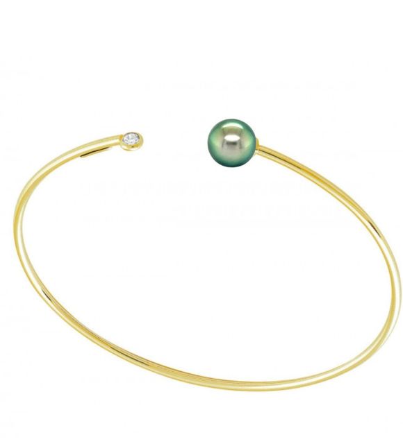 Étoile, ce bracelet magnifique se pare d'une perle rare de Tahiti 9/10mm, un diamant naturel blanc étincelle l'ensemble pour un éclat inoubliable