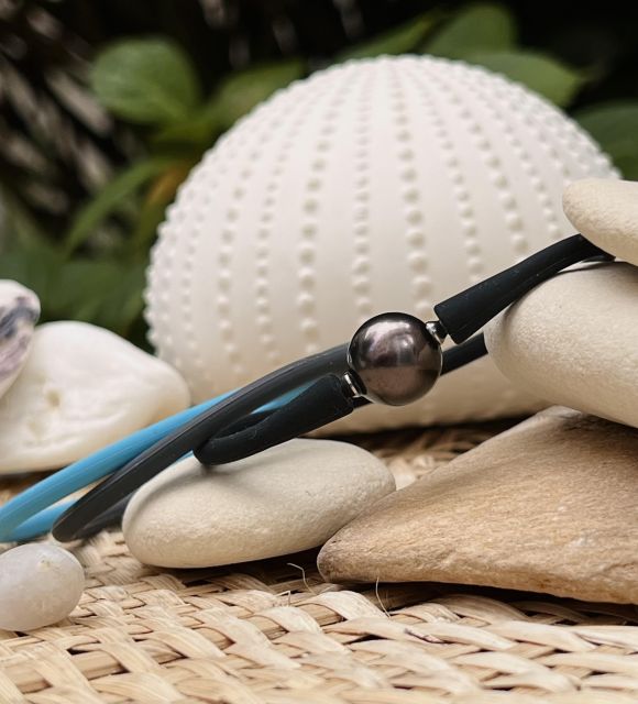 Bijou en perle de Tahiti aux reflets rares et lustre exceptionnel. Certificat d’authenticité et livraison sécurisée – Poemotu.