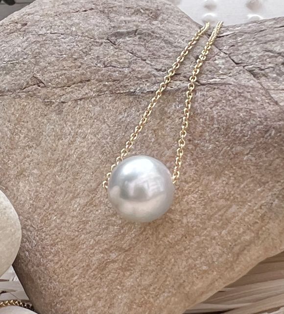 Bijou en perle de Tahiti aux reflets rares et lustre exceptionnel. Certificat d’authenticité et livraison sécurisée – Poemotu.