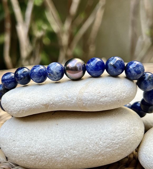 Bijou en perle de Tahiti aux reflets rares et lustre exceptionnel. Certificat d’authenticité et livraison sécurisée – Poemotu.